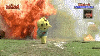 mono running through bombs; mascot running through fire